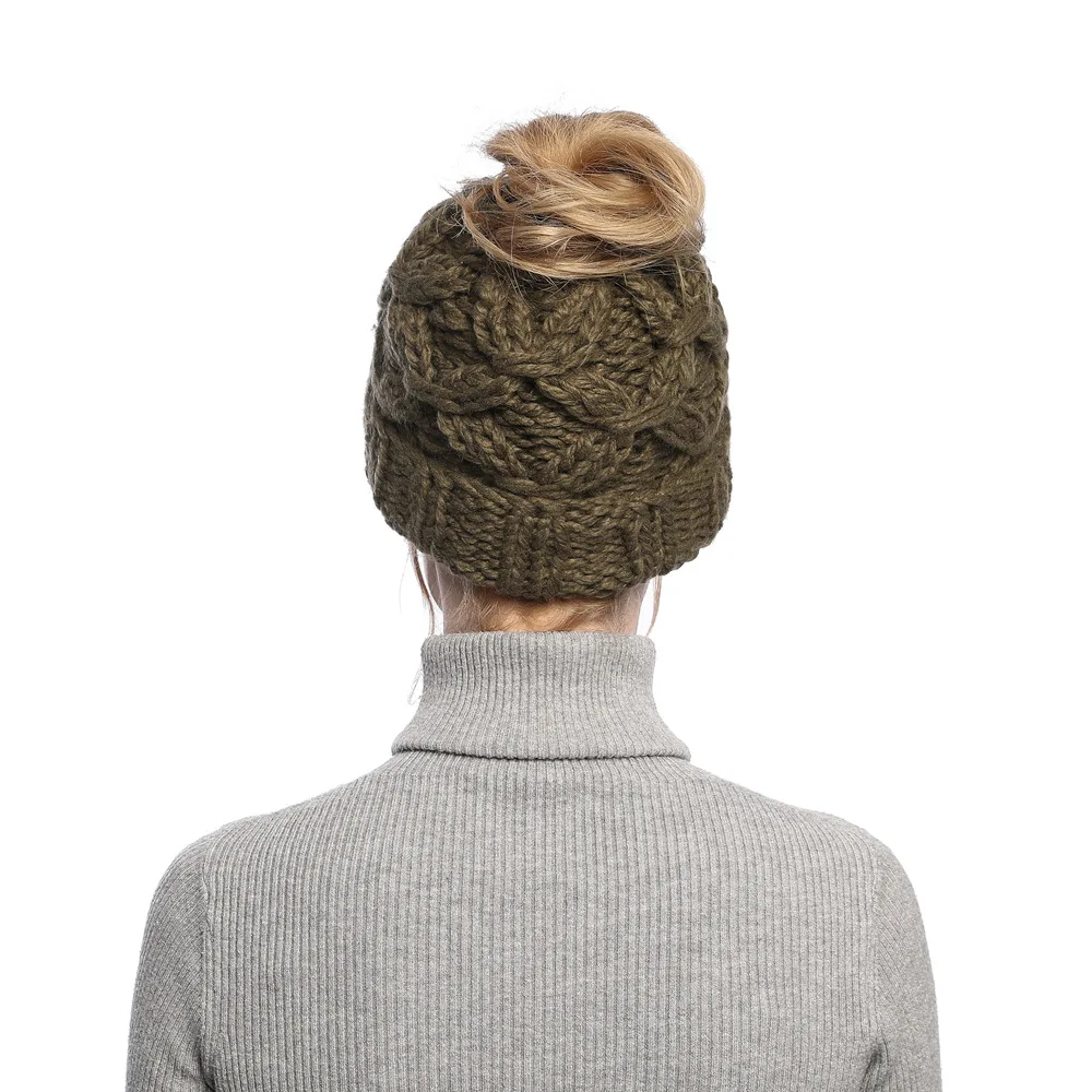 autumn and winter women's new knitted ponytail hat hair hair with an empty top hats head hats thickened to keep warm