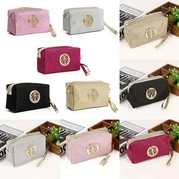 

Gold fashion lady cosmetic bag solid color storage travel cosmetics handbag sequins cosmetic bag handbag
