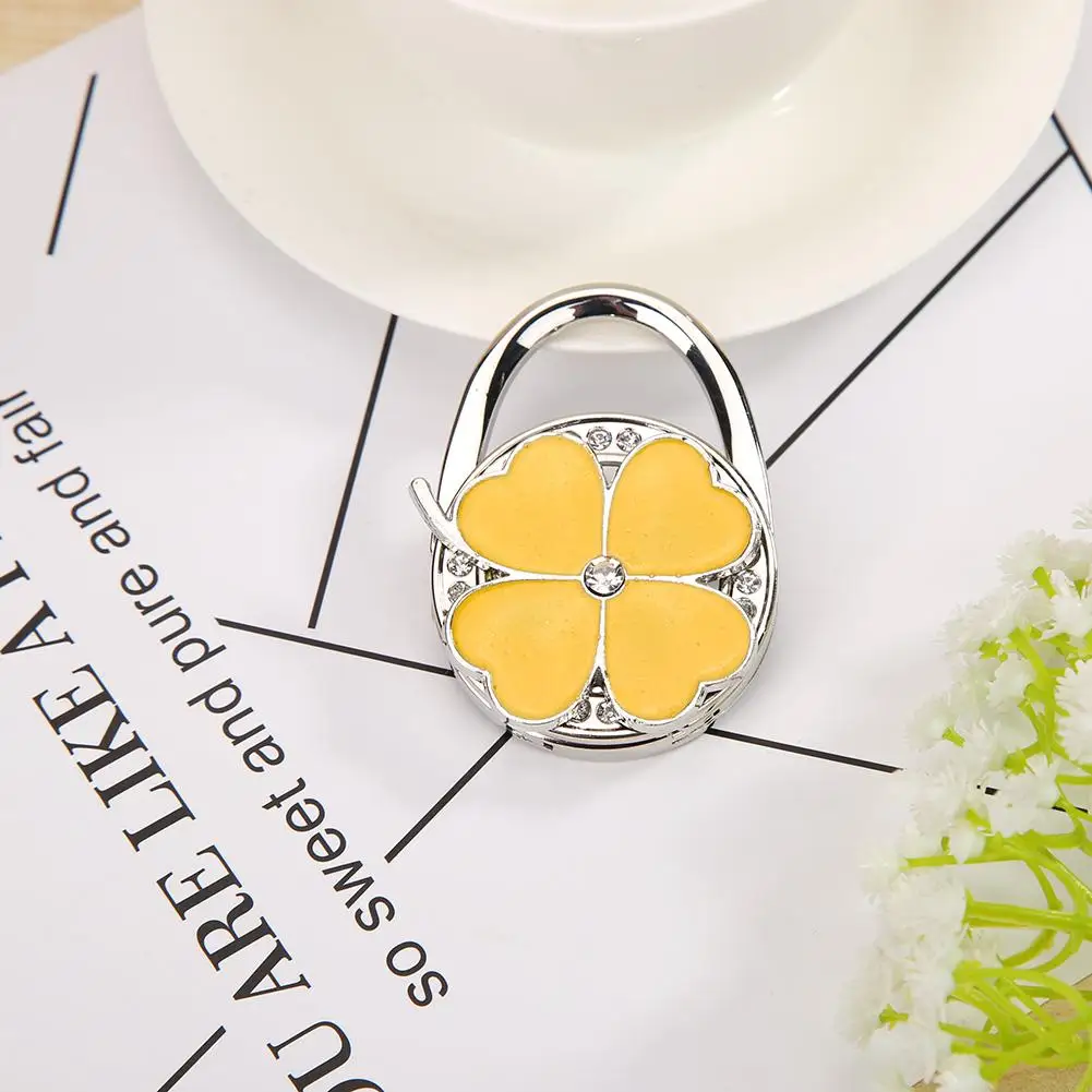 

Single Row Drill Hook Portable Lucky Flower Table Hook Originality Small Delicate and Portable for Hanging Wallets Bags