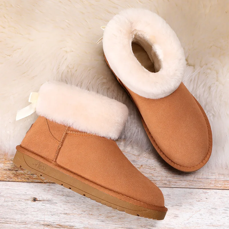 

Women's New Wool Snow Boots Female 2019 Winter Cow Leather Fashion Wild Leather Bread Shoes Women Thickened Bow Cotton Boots