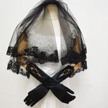 Свадебное платье из органзы, атласные перчатки, есть ссылка на манжету, мотив ручной работы, черный и белый цвет