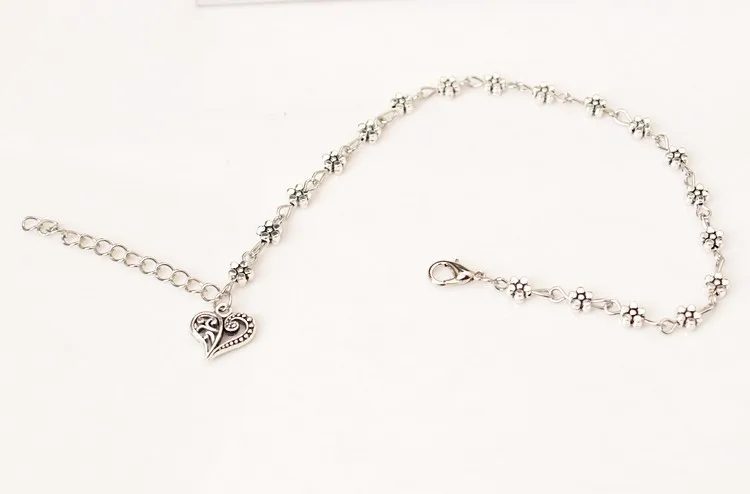 

Vintage Silver Tibetan Silver Hollow out Plum Small Flower Foot Ornaments Peach Heart Shape Anklet Bracelets AliExpress New Styl