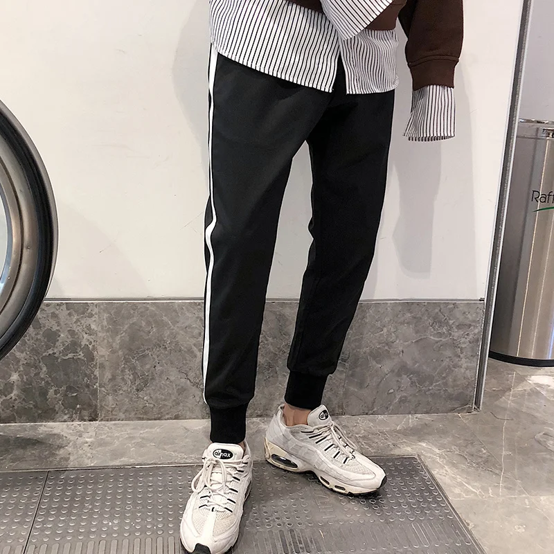 

2019 men's spring and autumn new casual fashion simple trend slim body cool pure color breathable double white edge striped swea