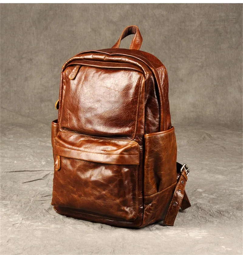PNDME модный винтажный высококачественный мужской рюкзак из натуральной кожи, повседневный простой воловьей кожи, дизайнерские Роскошные дорожные сумки для ноутбука