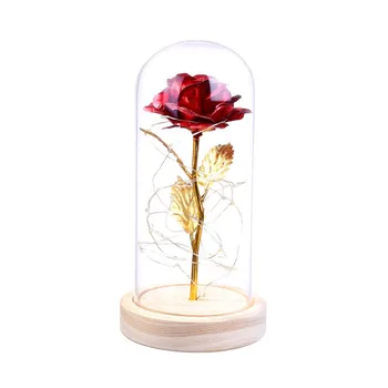 

Artificial Gold Rose Flower And LED Light String In Glass Dome On Wooden Base The Best Gift For Valentine’s Day