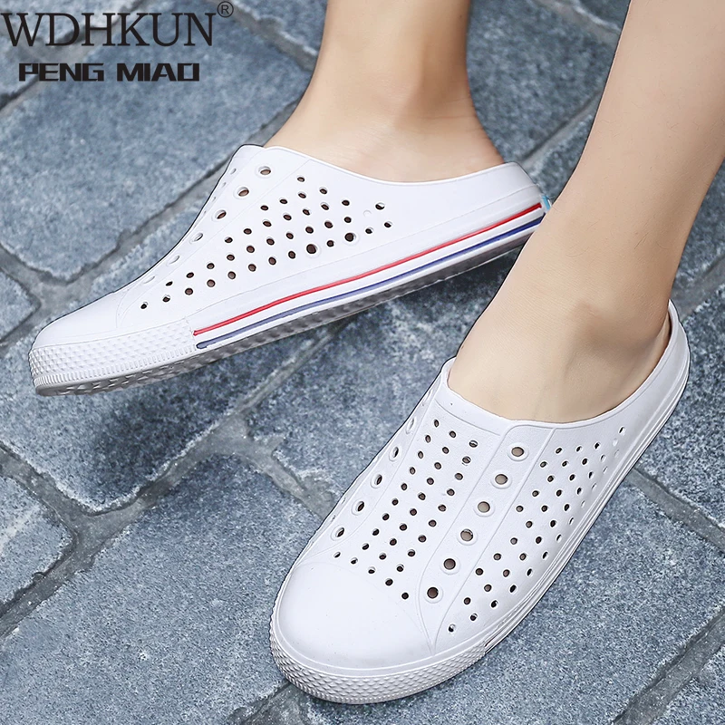 white rubber clogs