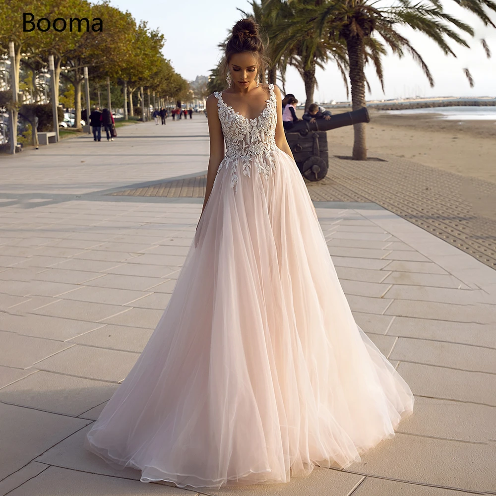 

Blush V-Neck Princess Wedding Dresses Spaghetti Straps Appliques Beach Bride Dresses Open Back Illusion A-Line Bridal Gowns