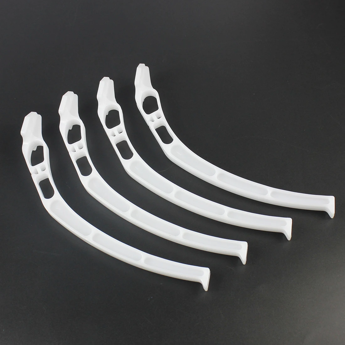 Détail des fixations du train d'atterrissage F550 Land Skid 140mm pour DJI F450 F550, avec vis et supports métalliques.