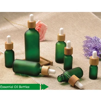 

Tube 10ml 20ml 30ml 50ml 100ml frosted green cosmetics glass bamboo dropper bottle with bamboo pipette for essential oil essence