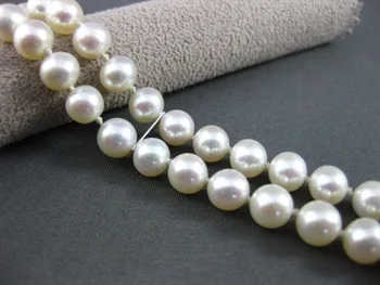 

0451 WHITE GOLD TWO ROW FILIGREE AAA SOUTH SEA PEARL BRACELET