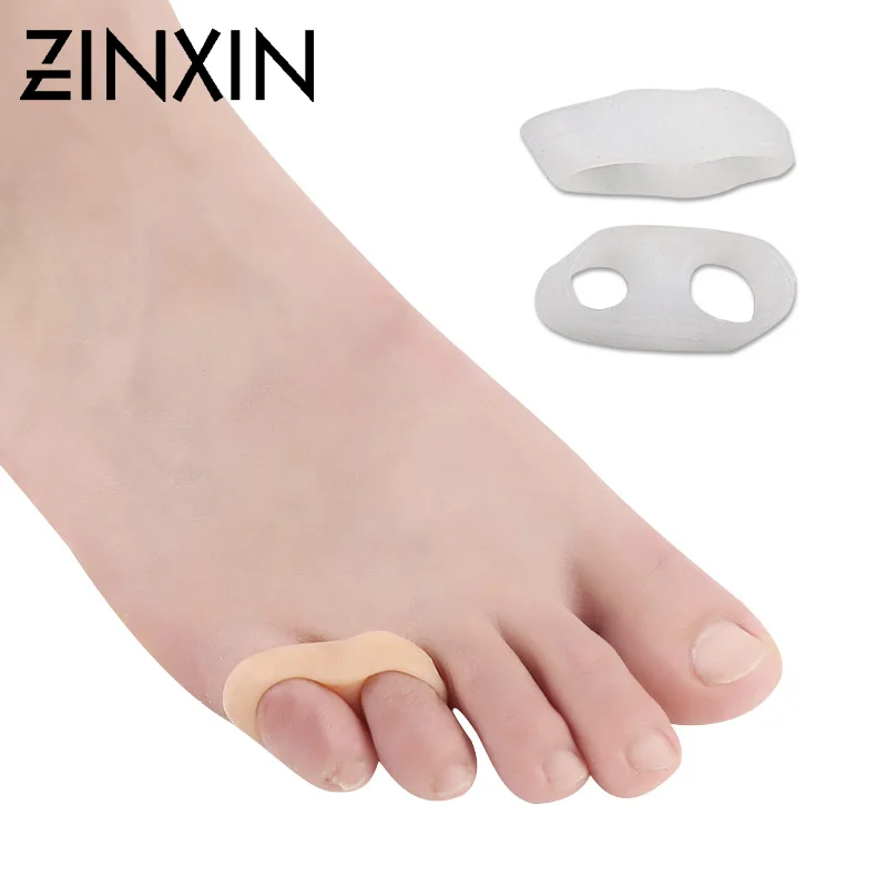 перегородка силиконовая межпальцевая lum 802. силиконовый бурсопротектор. межпальцевые разделители ортопедические. разделители межпальцевые в1165687. межпальцевый ортопедический разделитель корректор пальцев стопы.