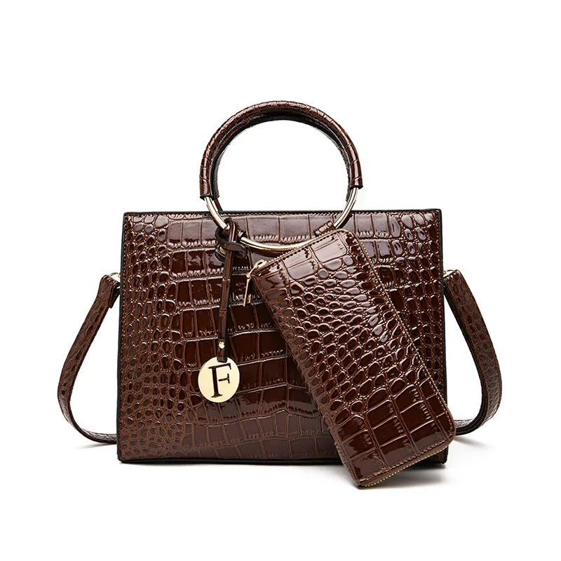 

Western Style Embossed Stone Pattern Lady Bags 2019 New Style Circular Ring Picture Handbag Export Crossbody Bag
