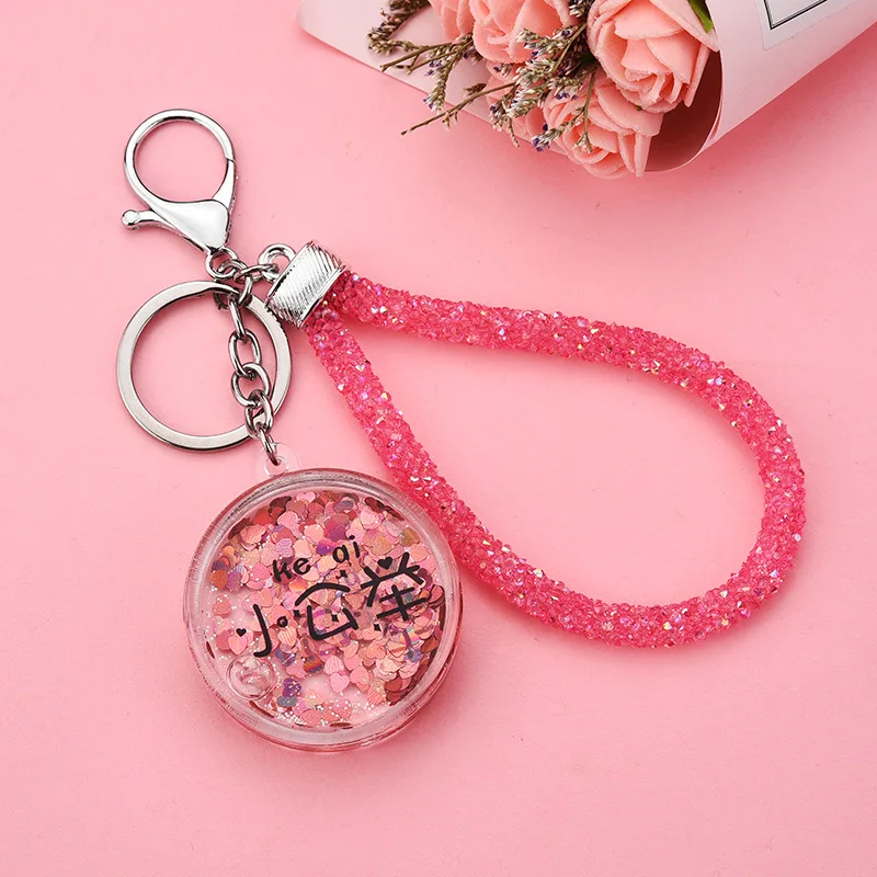 

Han edition yakeli personality into oil quicksand key chain gold liquid fashion lady handbags pendant car accessories