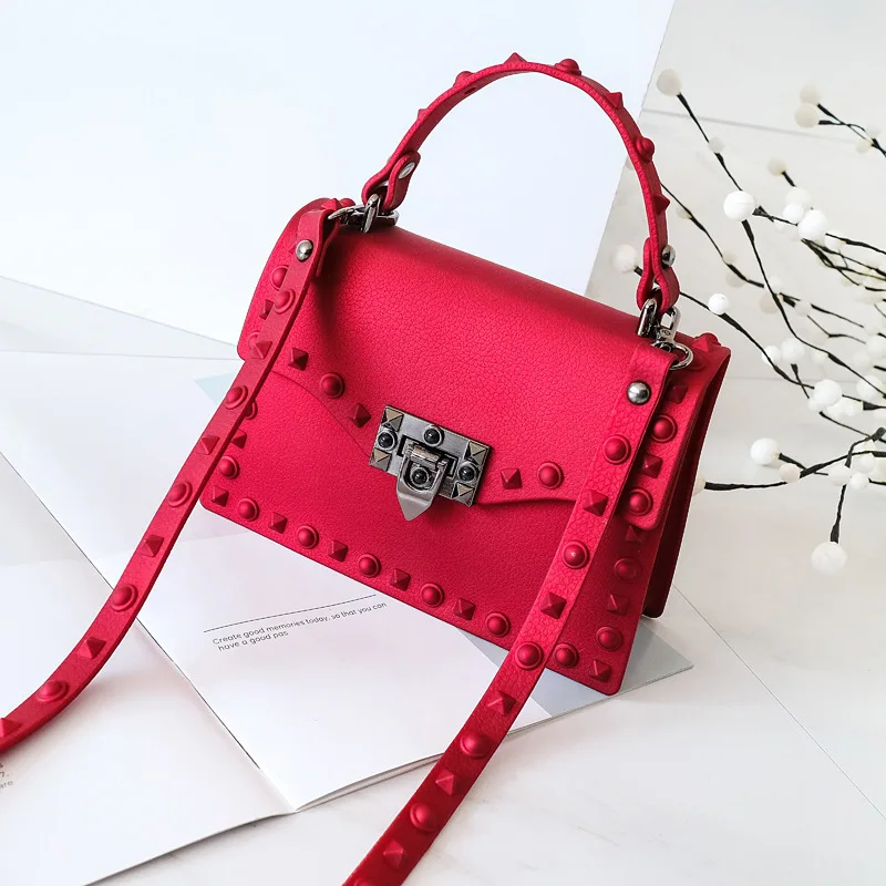 

2019 New Grinding Rivets Jelly Package Moisture Fashion Women's Package Lock Snap Portable Single Shoulder Pack.