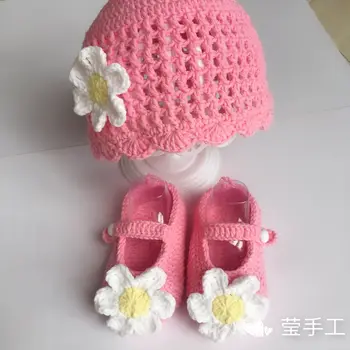 

A set of hand-made Crochet Baby flower shoes and hats