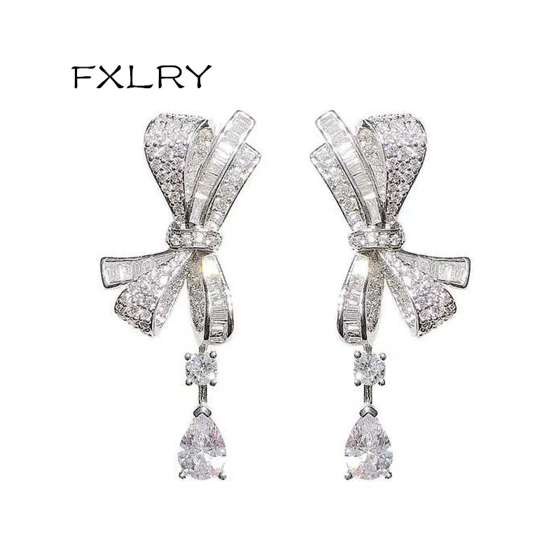 

FXLRY elegant white color cubic zirconia bowknot shinning stud earrings for Girls Dating Fashion Jewellery