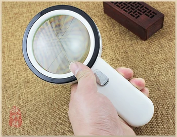 

Handheld Illuminated Elderly Peolple Newspaper Reading Helping Hand Magnifier Jewel Lighted Magnifying Glass 10x with LED Lights
