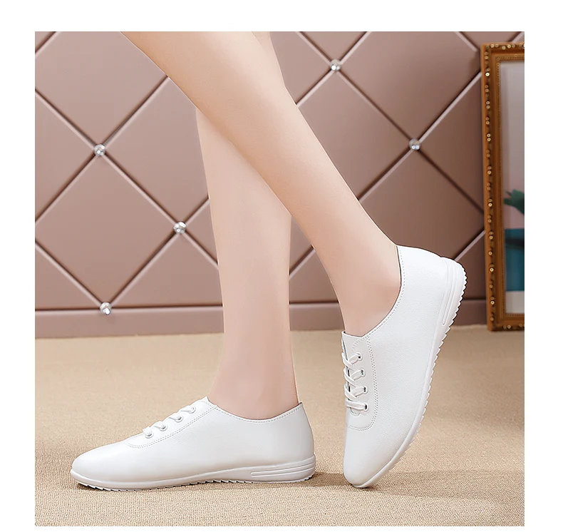 white leather lace up nursing shoes