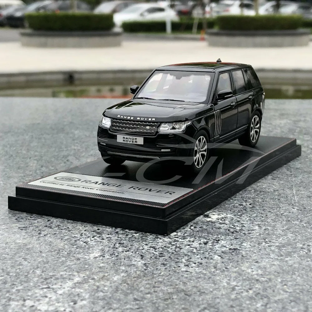 Модель автомобиля ЖК Модели Range Rover 1:43 (черный) + маленький подарок!| |