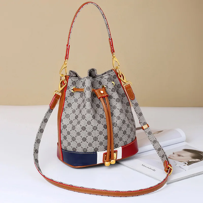 

and the United States to restore ancient ways, high-capacity portable handbag bucket chain oblique satchel joker bag