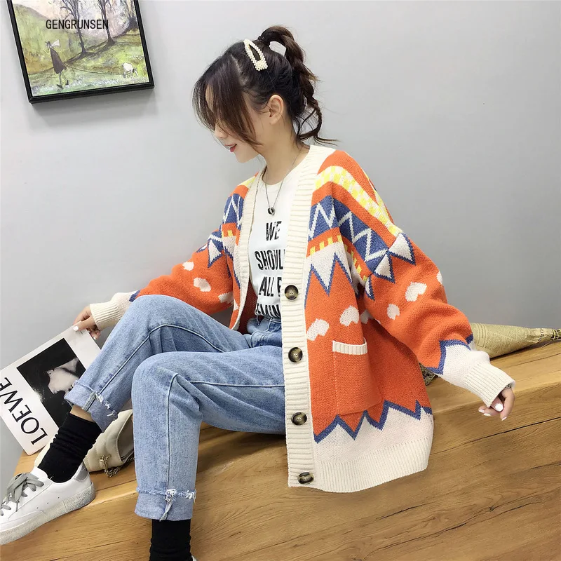 

Autumn and winter very fairy knitted cardigan mid long hot selling Korean version loose lazy pocket coat women's sweater