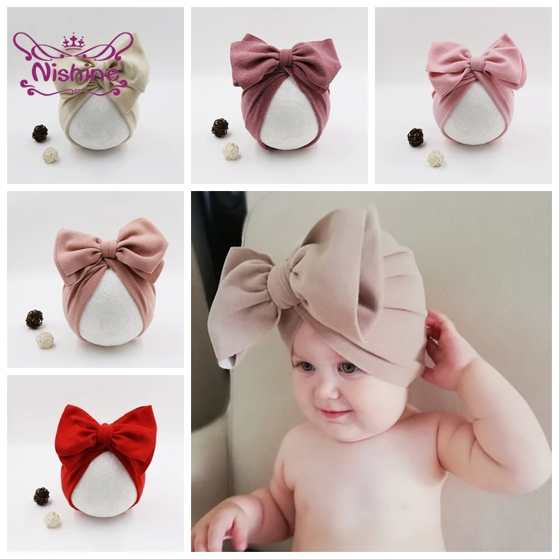 

Nishine Newborn Baby Solid Color Cotton Hats Infant Toddler Bow Turban Beanie Cap Kids Children Birthday Gifts Photo Props