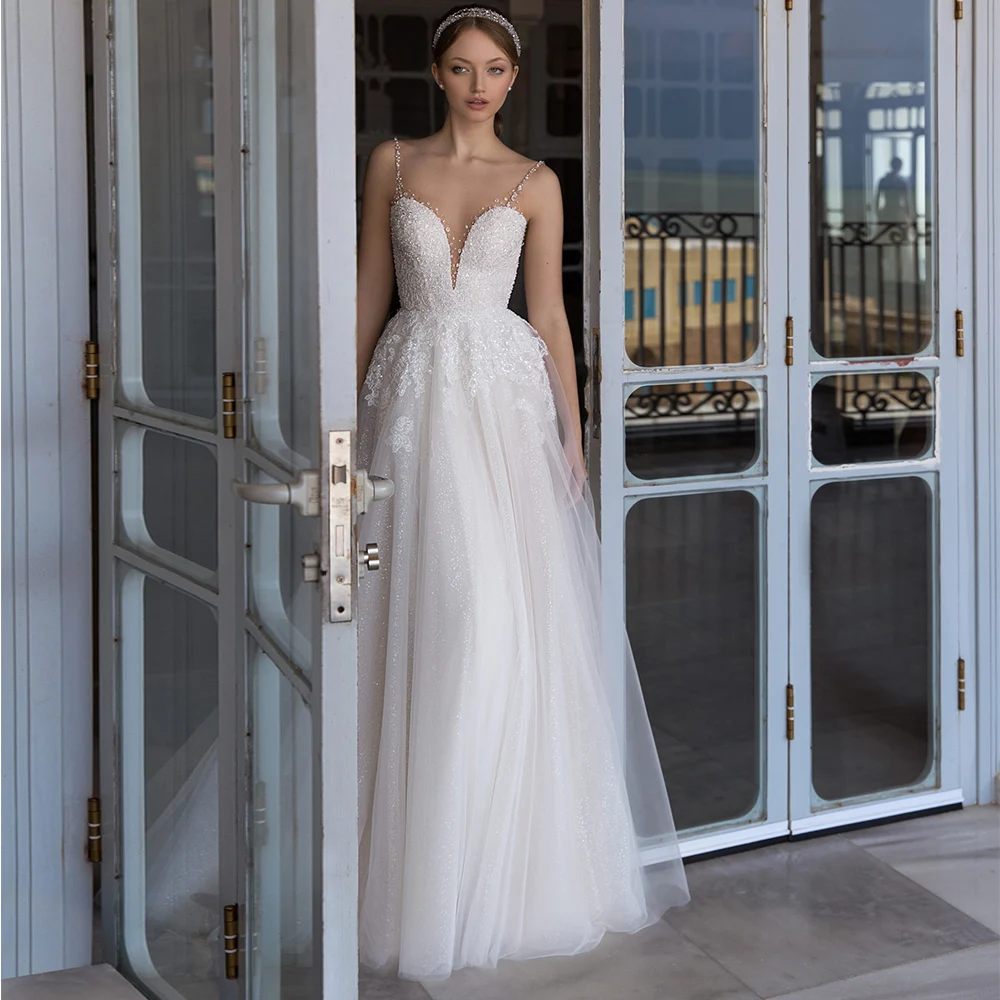 

Luxury Sequin Crystal Tulle Bridal Dress 2020 V-neck Spagehetti Straps Sweep Train A Line Wedding Dress with Applique