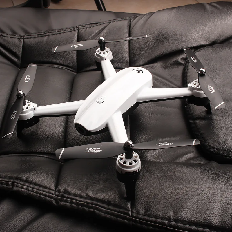 

S165 Follow Unmanned Aerial Vehicle Optical Flow Positioning Gesture Photo Shoot Double Camera Aerial Photography Quadcopter Rem