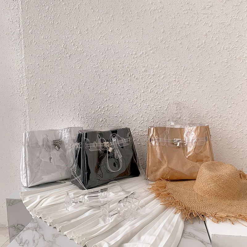 

2019 lady Jelly Shoulder Bags white Color Handbags Large Capacity PVC Transparent Lock Decoration Kraft Paper Messenger Bag