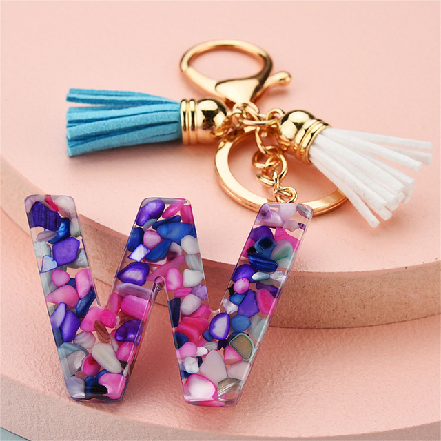 Women Keychains 26 Glitter Hollowed-out Words Handbag Tassel English Letter Keyring with Puffer Ball Charms Free Shipping