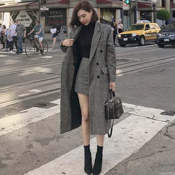 

The new Korean version of the 2019 winter bird lattice long woolen coat with hip skirt woolen coat suit women