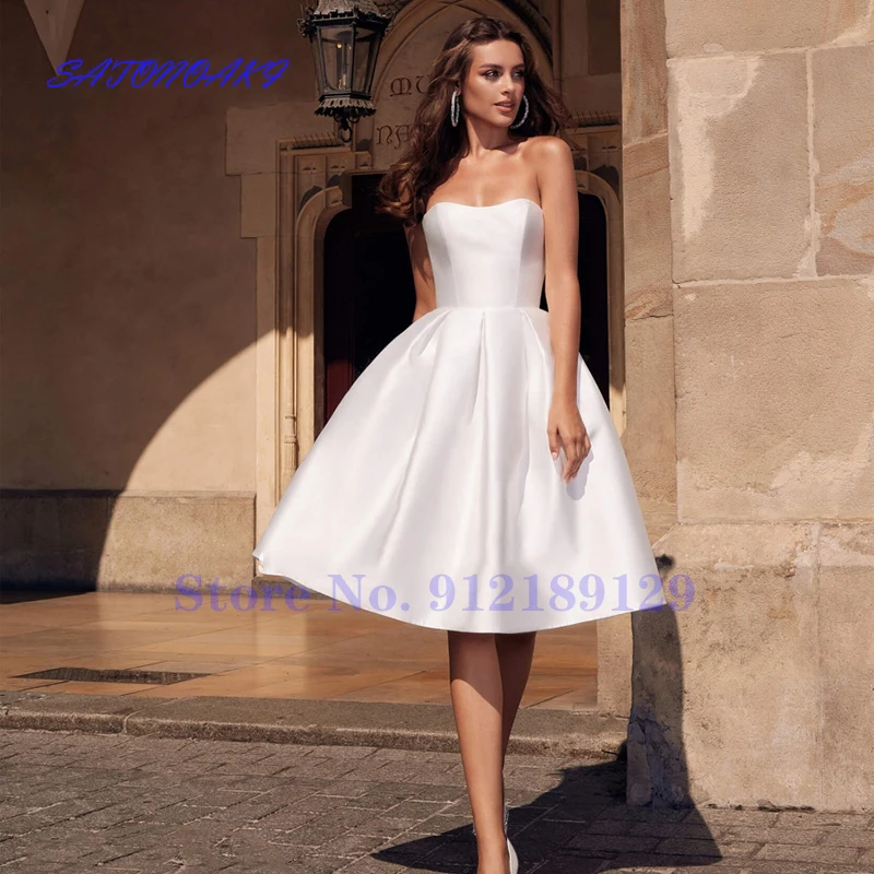 vestido-de-casamento-curto-branco-vestido-de-noiva-curto-sem-costas-na-altura-do-joelho-com-bolsos