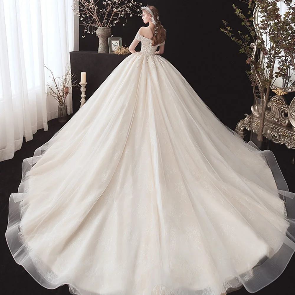 Abiti da sposa in pizzo con paillettes perline fiori abiti da