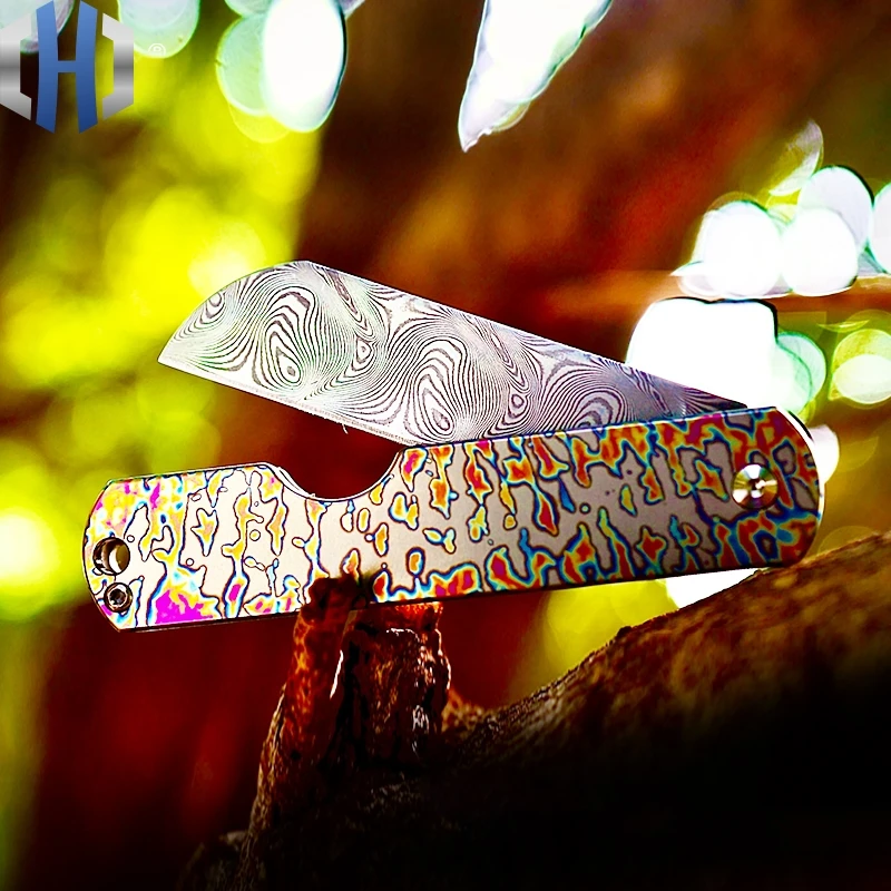 

Child's Pencil Sharpener M390 And Damascus Sharpener EDC Knife