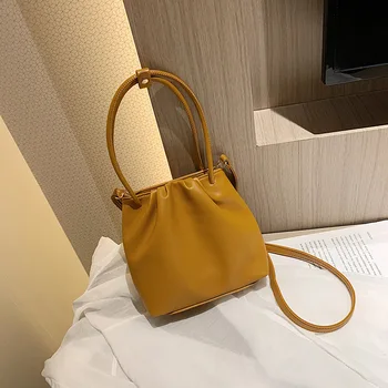 

Retro casual one-shoulder armpit female bag 2020 summer on the new foreign air slung portable tote bag fashion small bag