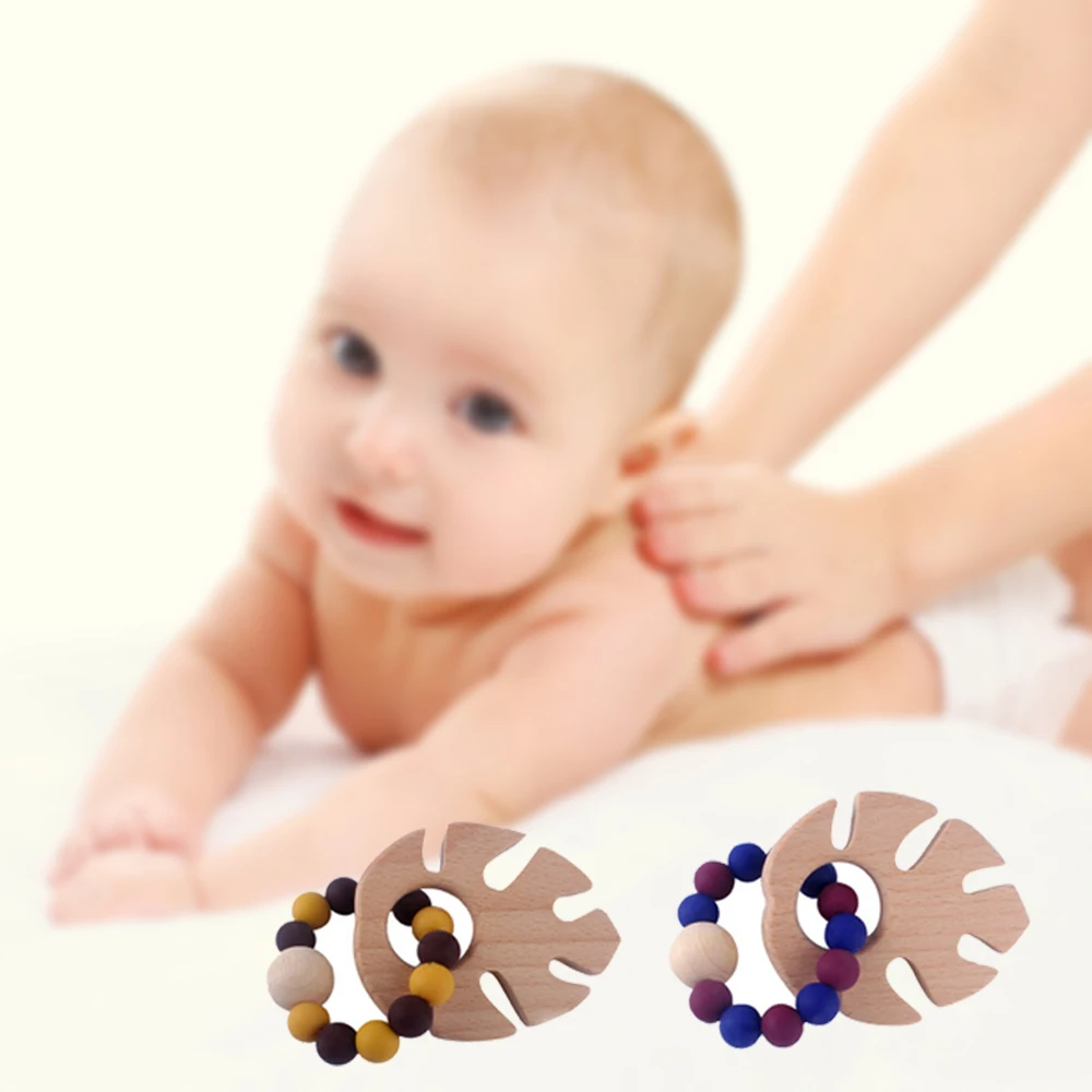 

Baby Eucalyptus Leaves Molar Teether Bracelet Baby Nursing Bracelets Wooden Teether Silicone Beads Teething Wood Rattles Toys