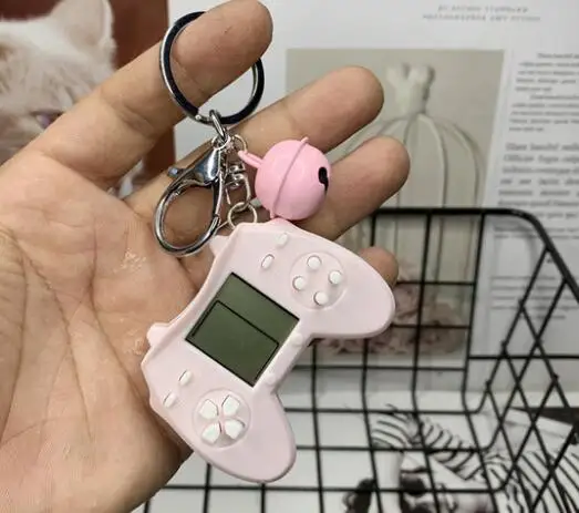 Retro Console Game Keychain Built-In 7 Games Puzzle Video Game Mini Handheld Game Console Pendant New Year Xmas Gift For Kids 