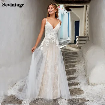 

Sevintage Lace Boho Wedding Dresses Beach Appliques Buttons Backless Bridal Gown Princess Long Train Bride Party Dresses 2020
