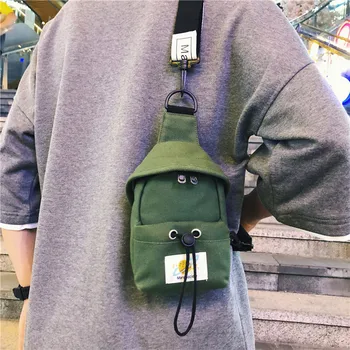 

2020 Korean version of the new fashion messenger chest bag men and women couples street shooting mobile phone bag messenger bag