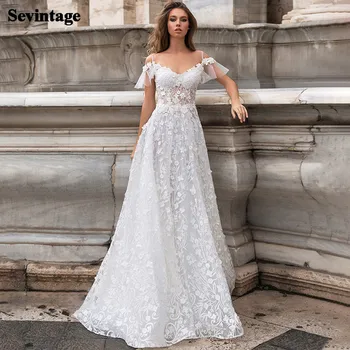 

Sevintage New Boho Wedding Dresses Off the Shoulder Bridal Gown Lace Appliques Short Sleeve Backless Beach Wedding Party Gowns