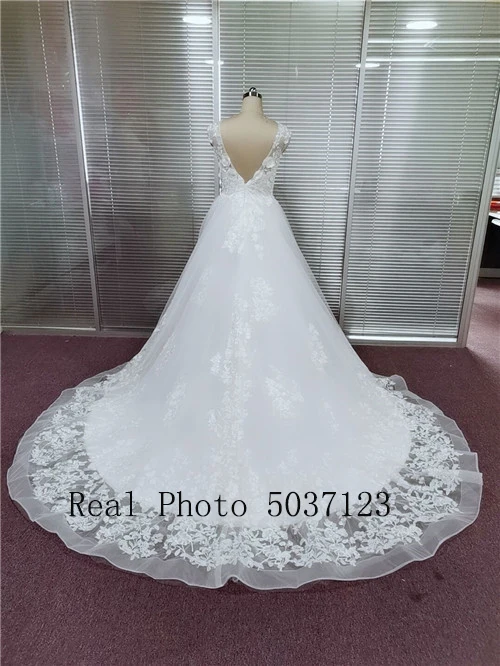 Ball Gown Illusion Scoop Wedding Dresses with Cap Sleeves Sexy Sleeveless V Back Lace Appliques Bridal Gowns Robe de Mariee