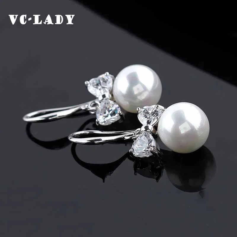 

Charm Fashion Harmonie Perfect Circle imitation pearl Bow Earrings Wholesale Jewelry For Women B8 E088 Jewellery