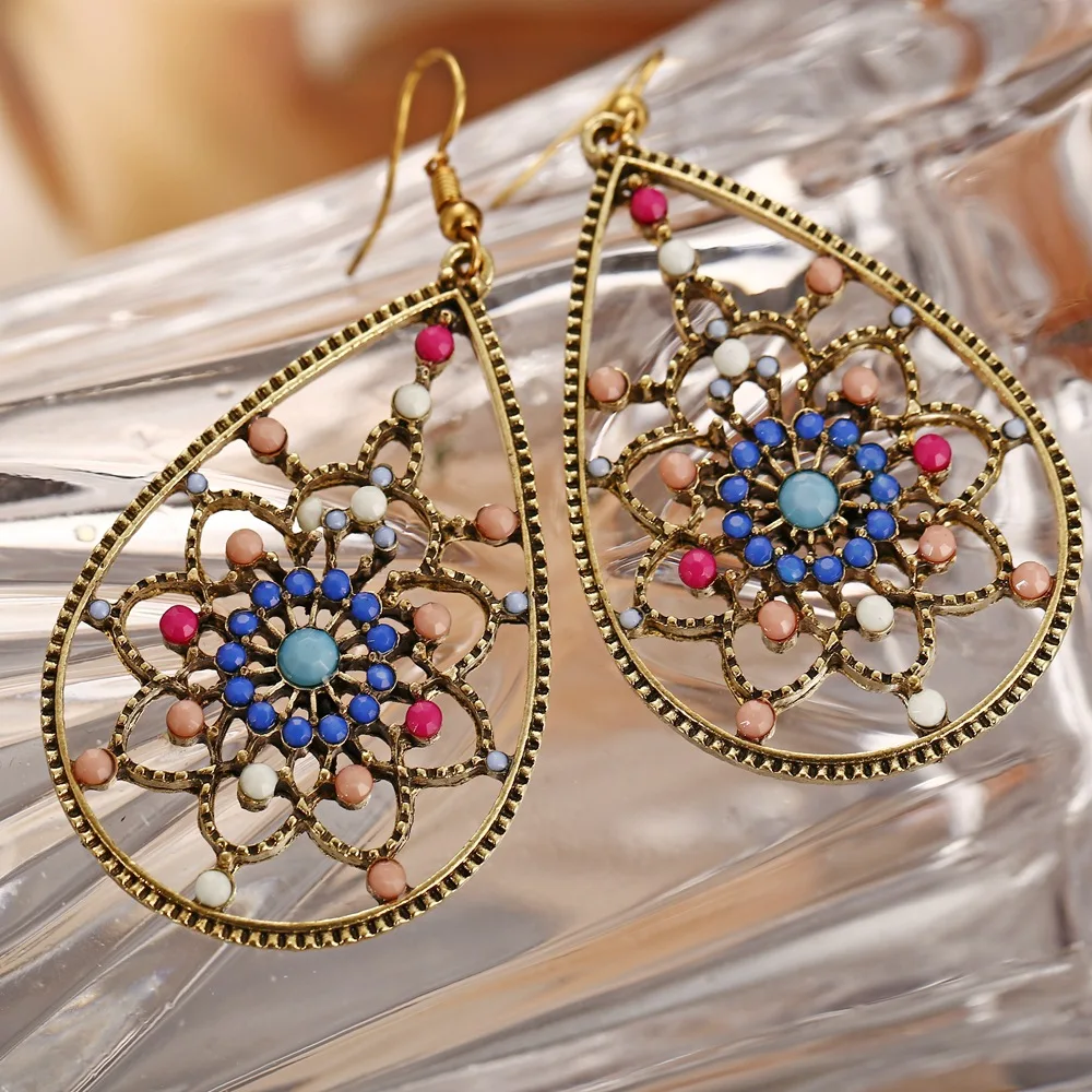 Jinwateryu Europe and the United States drip plastic hollow flower water drop earrings creative retro ethnic style wome | Украшения и