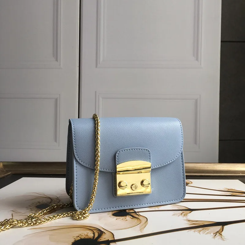 De alta calidad bolsos de cuero genuino de las mujeres cadena de oro bolsa de lujo Cartera de mujer con diseño exclusivo de moda 100% bolso de piel de vacuno