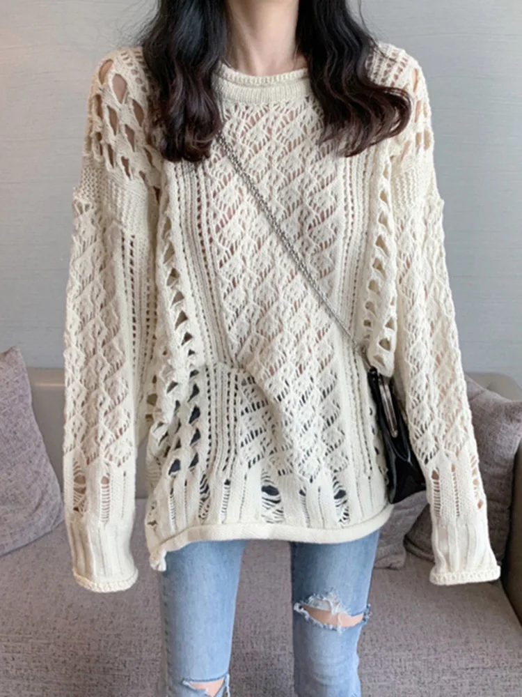 

Autumn and winter women's hollow sweater loose and lazy knitted long-sleeved curled sweater women