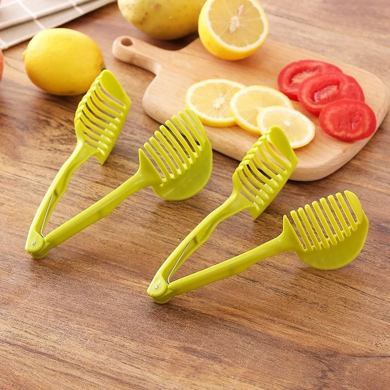https://ae01.alicdn.com/kf/H0ad65c329107492db54065e698ac0178E/Aluminum-Alloy-Kitchen-Handheld-Orange-Lemon-Slicer-Tomato-Cutting-Clip-Fruit-Slicer-Onion-Slicer-Kitchen-Item.jpg