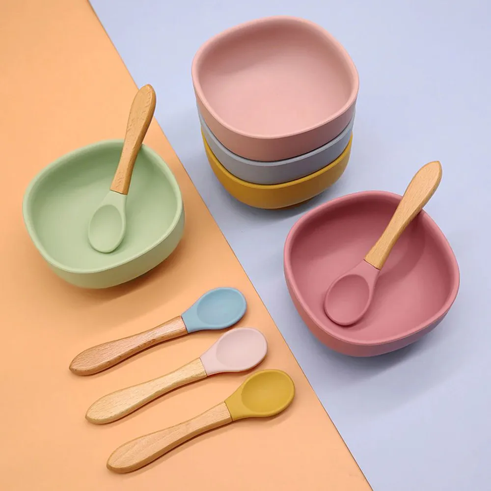 https://ae01.alicdn.com/kf/H0ade807049254b59a40ef87a93eec6c8d/Baby-Feeding-Spoons-with-Wooden-Handle-Children-s-Cutlery-Baby-Utensils-Soild-Feeding-Soft-Silicone-Tableware.jpg