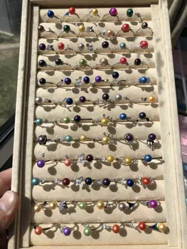 

10 rings with pearls and 5 pendants with pearls GS060