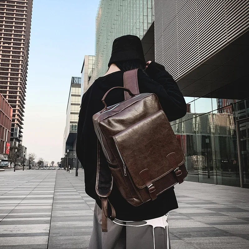 

2020 new waterproof backpack men pu fashion trend retro school bag pure color simple and versatile business backpack