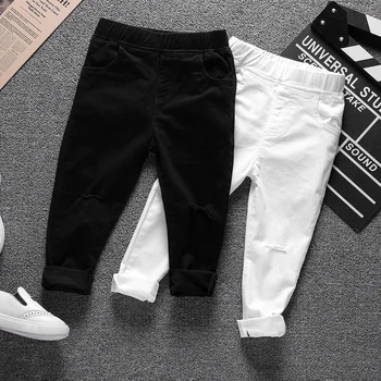 

2020 New Spring Baby Boys Girls Fashion Clothes Solid Pants Hot Trousers Jeans Cotton Harem Hole Pants for Kids Casual Trousers